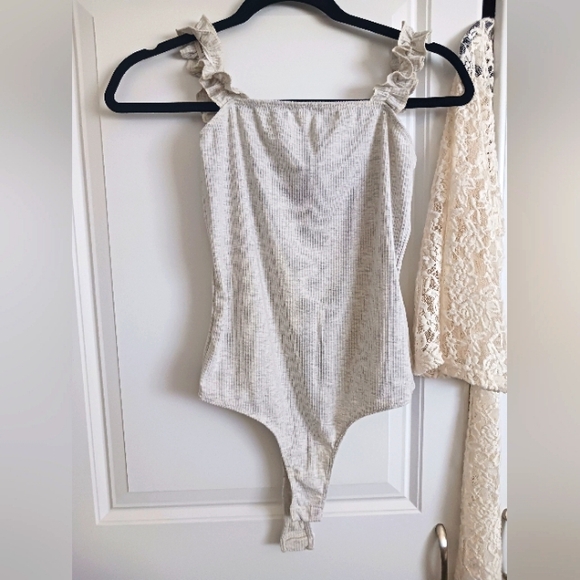 A bundle of 2 bodysuits:Saints 21 xs Light grey bodysuit & bozzollo mesh small - Picture 3 of 5